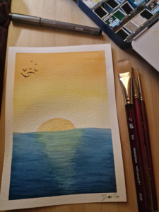 a watercolour of a sunset over the sea, going from orange at the top through yellow into white and then light blue and dark blue for the sea. these are the colours of the aroace flag. there's also a flock of birds done in black marker in the top left.